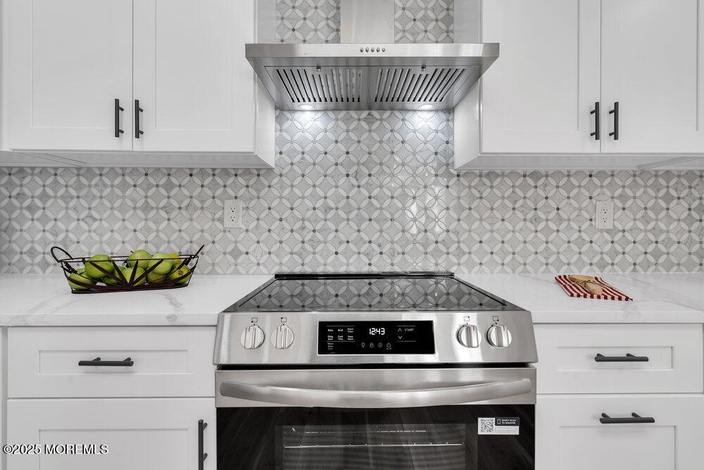 6 Berkeley Street, Unit 64 Whiting, NJ 08759 - Photo 12 of 31 a close view of a stove in the kitchen