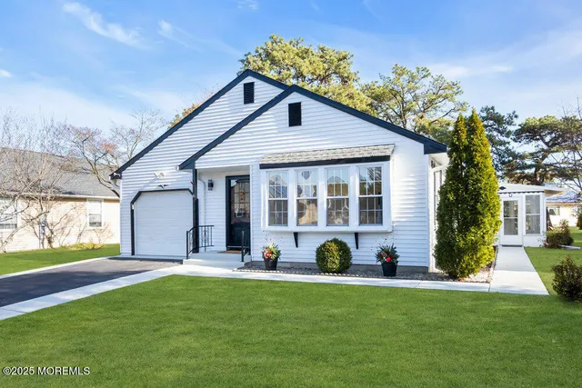 a front view of house with yard