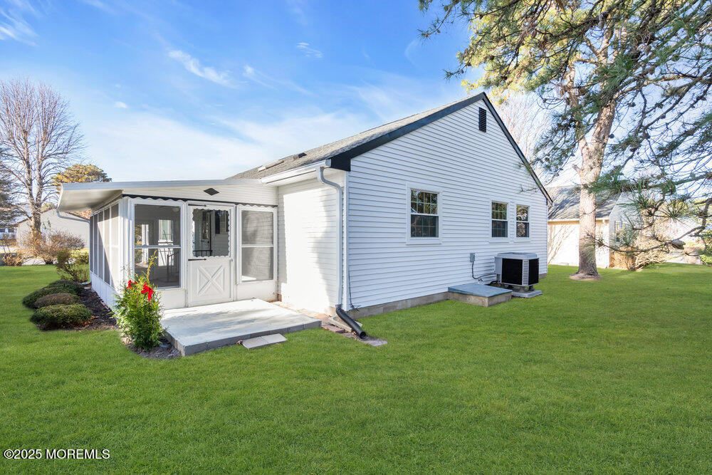 6 Berkeley Street, Unit 64 Whiting, NJ 08759 - Photo 30 of 31 a view of house with a yard