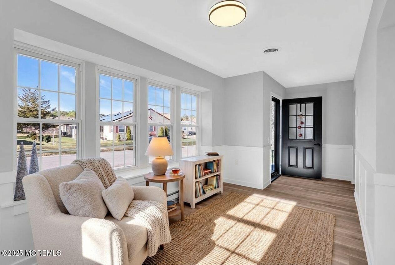 6 Berkeley Street, Unit 64 Whiting, NJ 08759 - Photo 3 of 31 a living room with furniture and a window