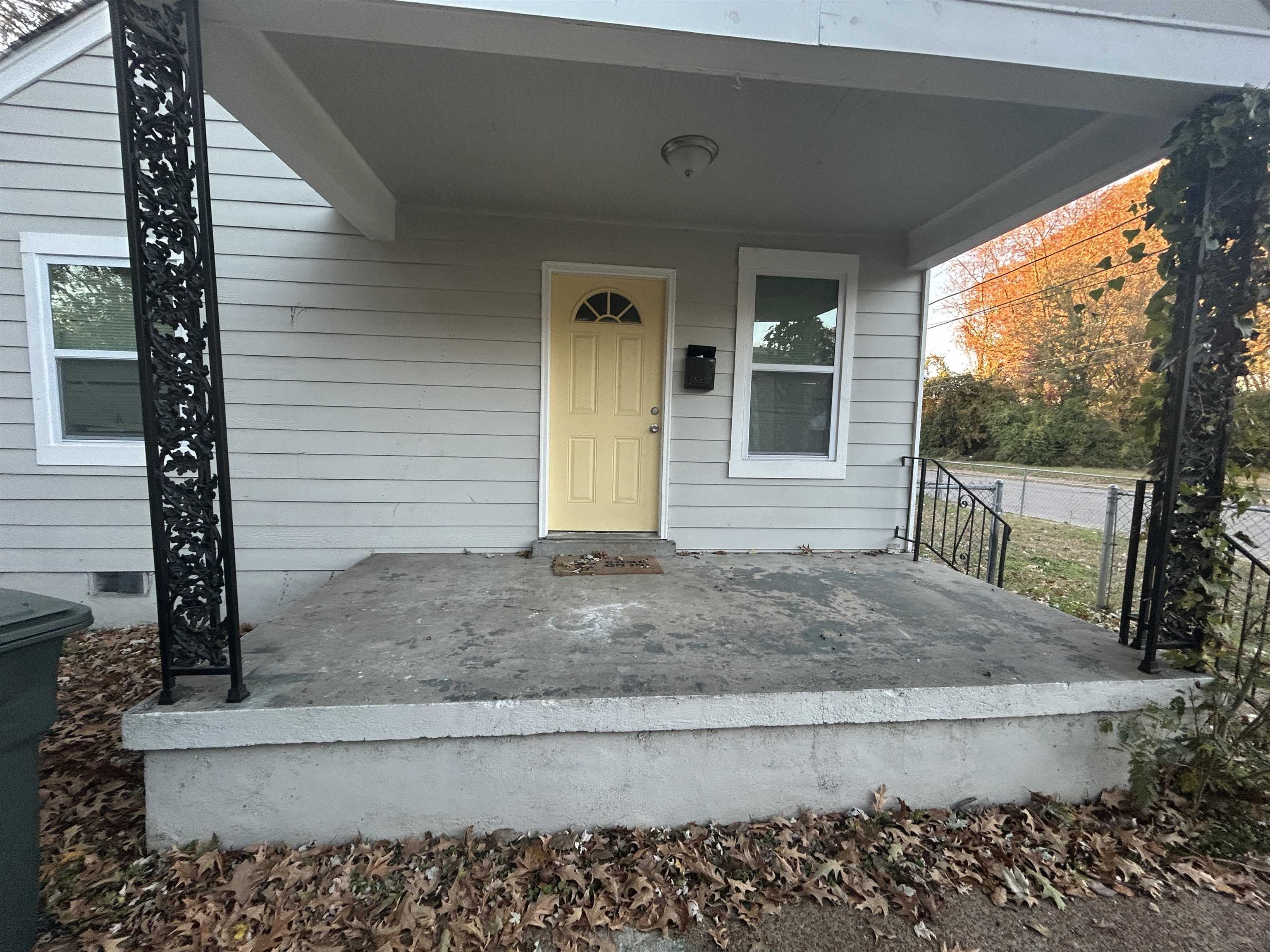 3569 Bayliss Avenue Memphis, TN 38122 - Photo 2 of 5 a view of front door and potted plants