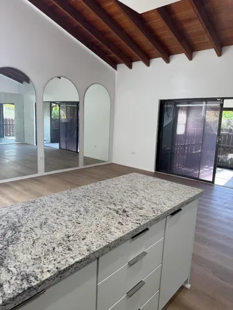 a view of a livingroom with wooden floor