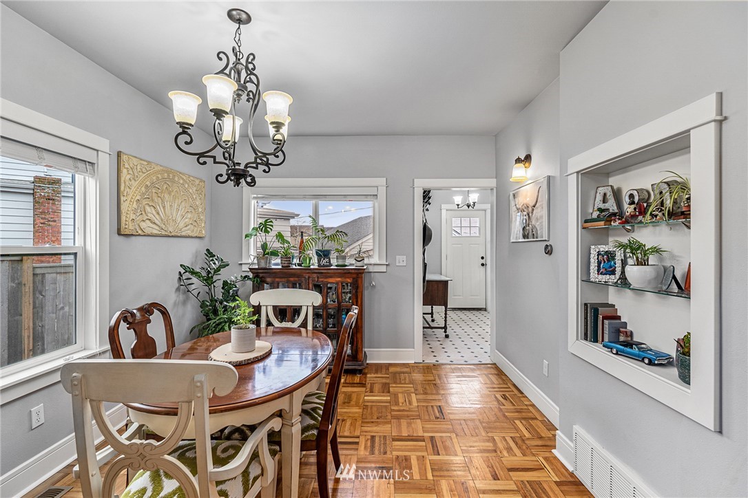 3020 Gedney Street Everett, WA 98201 - Photo 21 of 40 a view of a dining room with furniture and chandelier