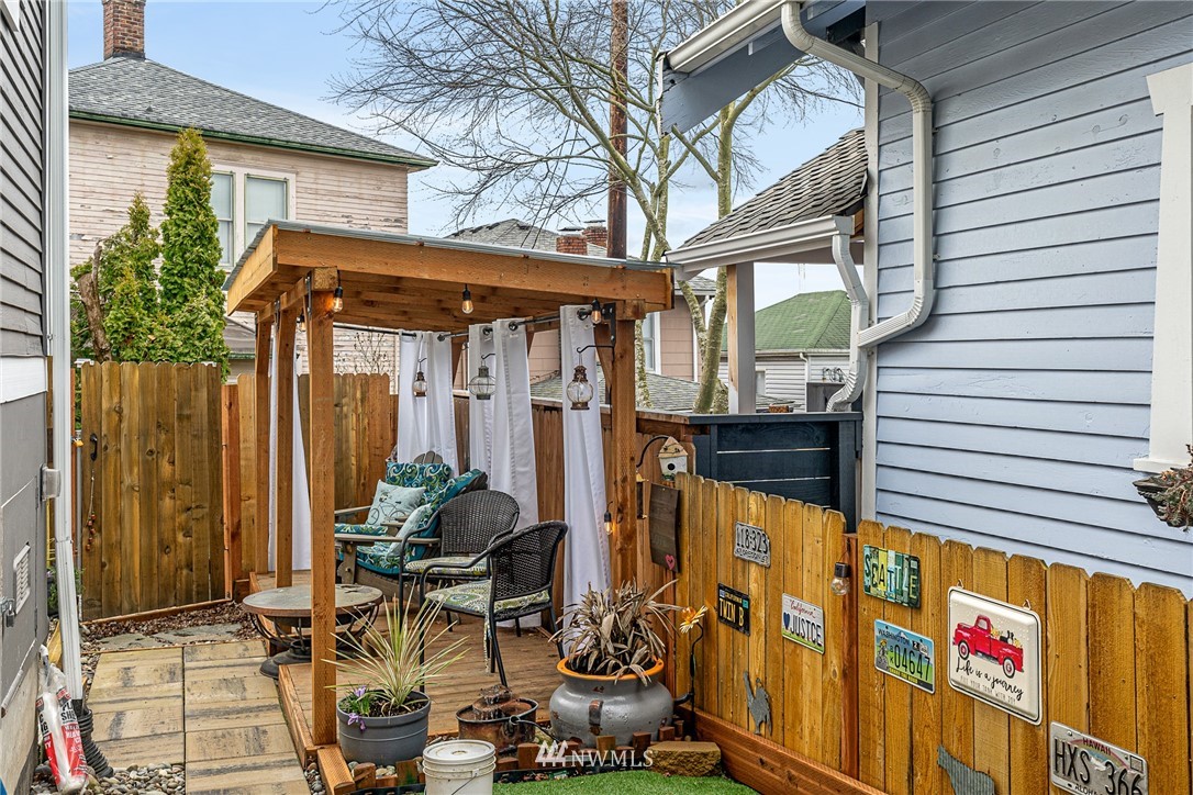 3020 Gedney Street Everett, WA 98201 - Photo 34 of 40 a view of a patio with chairs and table in a patio