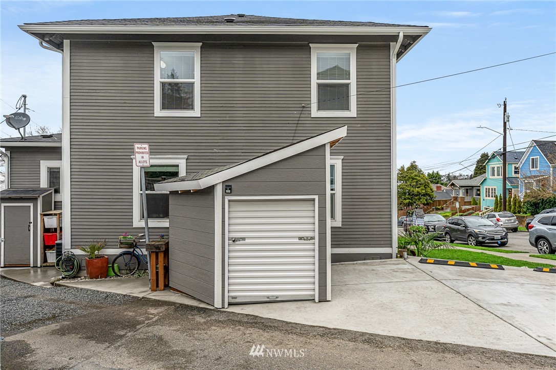 3020 Gedney Street Everett, WA 98201 - Photo 36 of 40 a view of a house with a patio and a yard