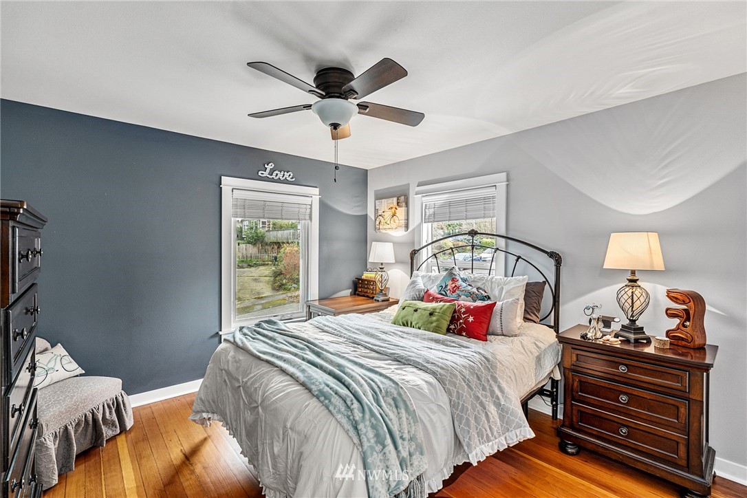 3020 Gedney Street Everett, WA 98201 - Photo 10 of 40 a bedroom with a bed and a chandelier