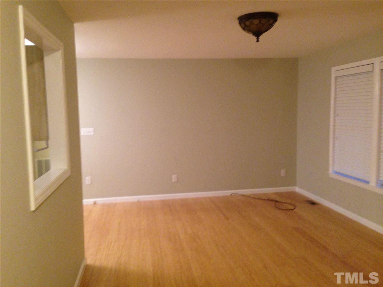 2704 Duke Homestead Road Durham, NC 27705 - Photo 5 of 25 Living Room opening to kitchen and opens to the dining room area