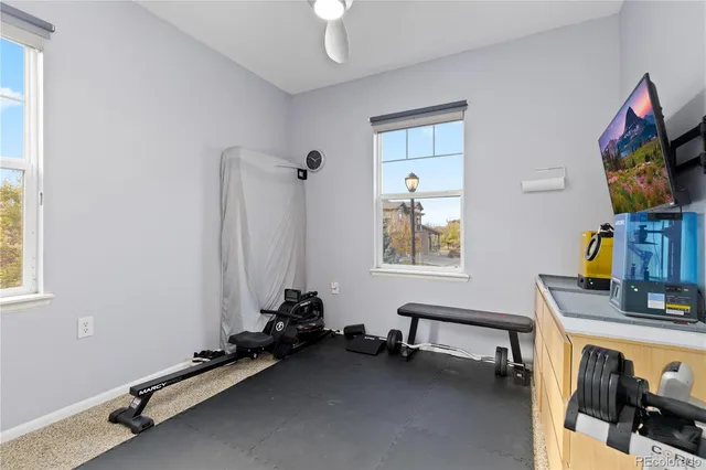 a room with furniture and a flat screen tv