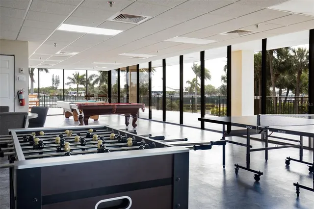 a view of a livingroom with furniture and staircase