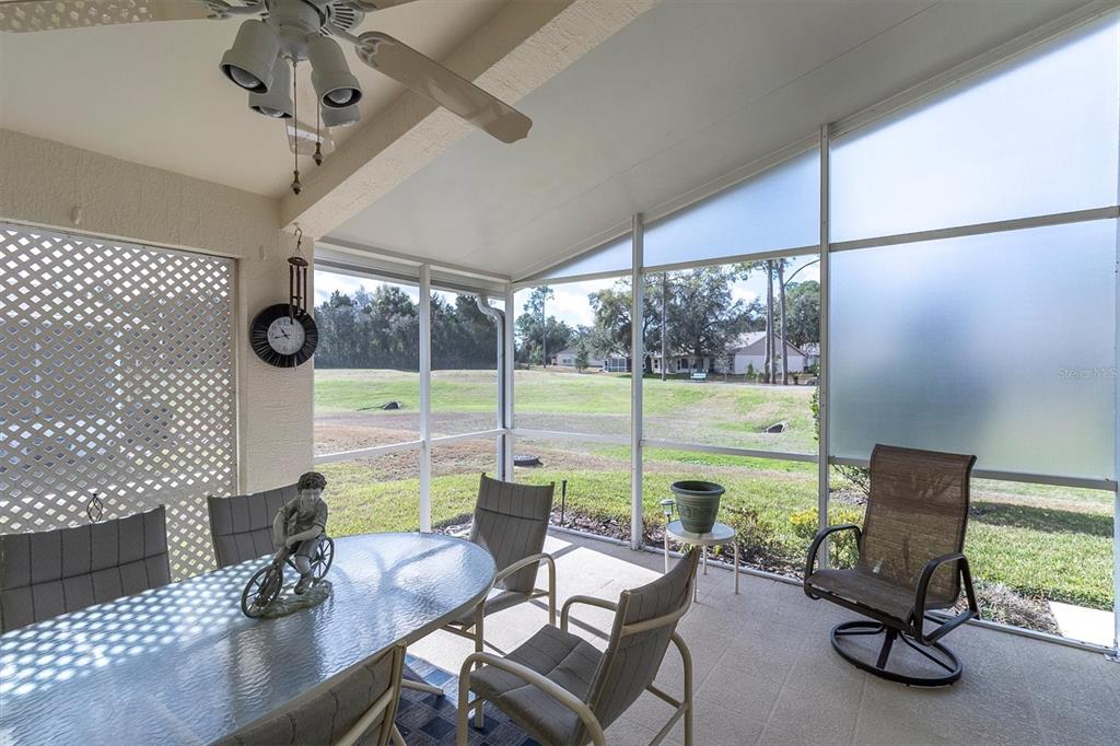 11634 Wheatfield Loop Hudson, FL 34667 - Photo 28 of 38 a view of a livingroom with furniture and a window