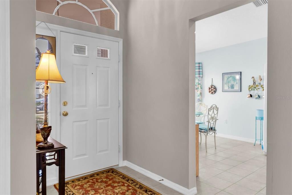 11634 Wheatfield Loop Hudson, FL 34667 - Photo 4 of 38 a bathroom with a sink and a mirror