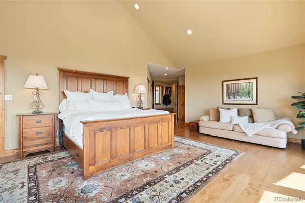 a bedroom with furniture and a dresser