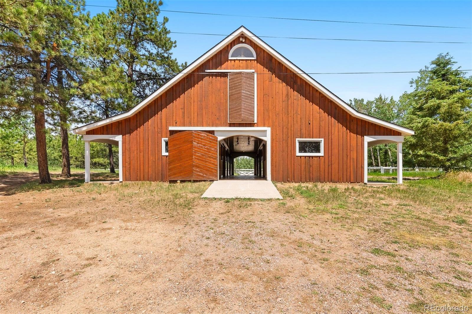12351 South Ridge Road Conifer, CO 80433 - Photo 3 of 50 a view of backyard of house