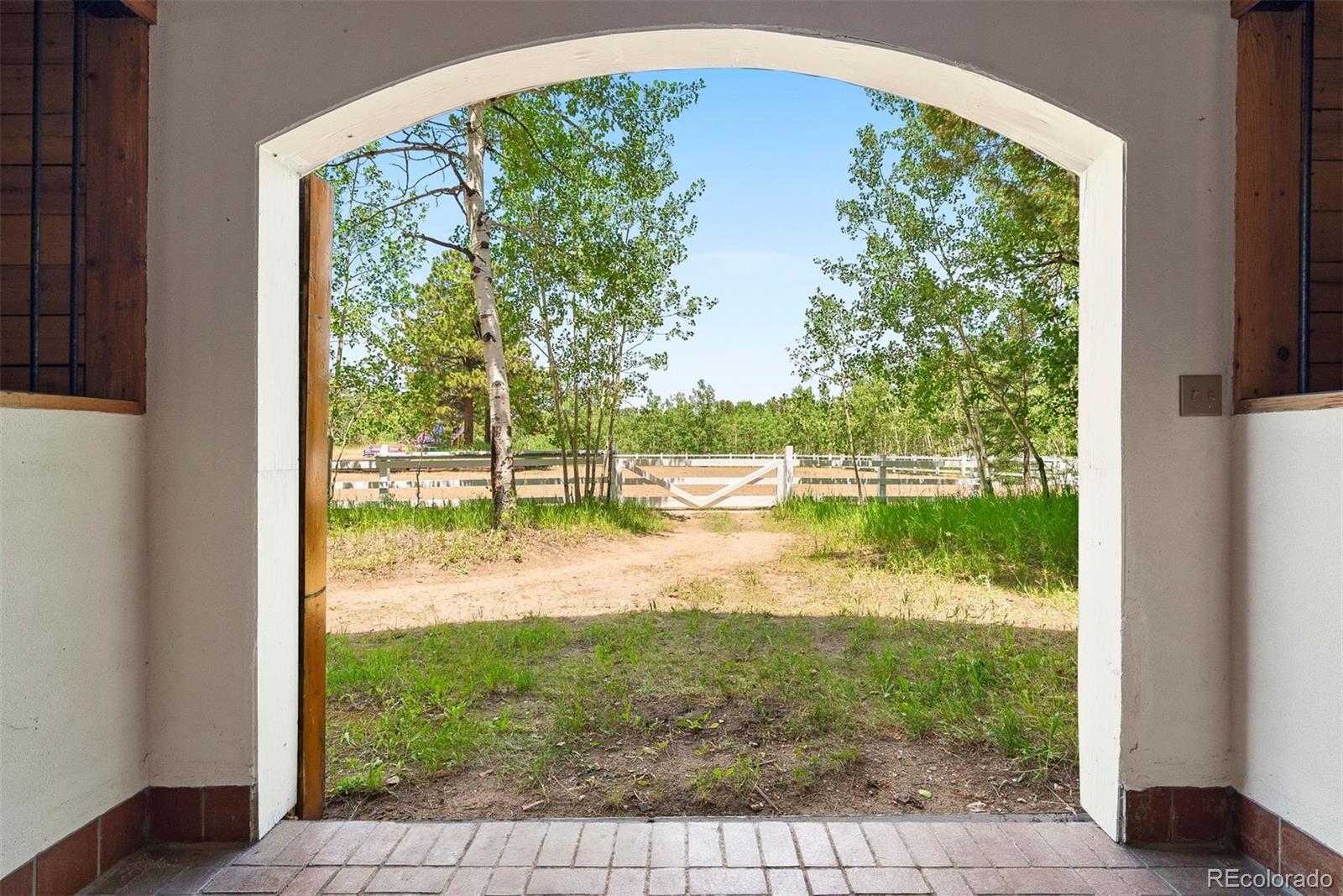 12351 South Ridge Road Conifer, CO 80433 - Photo 44 of 50 a view of a lake from a balcony
