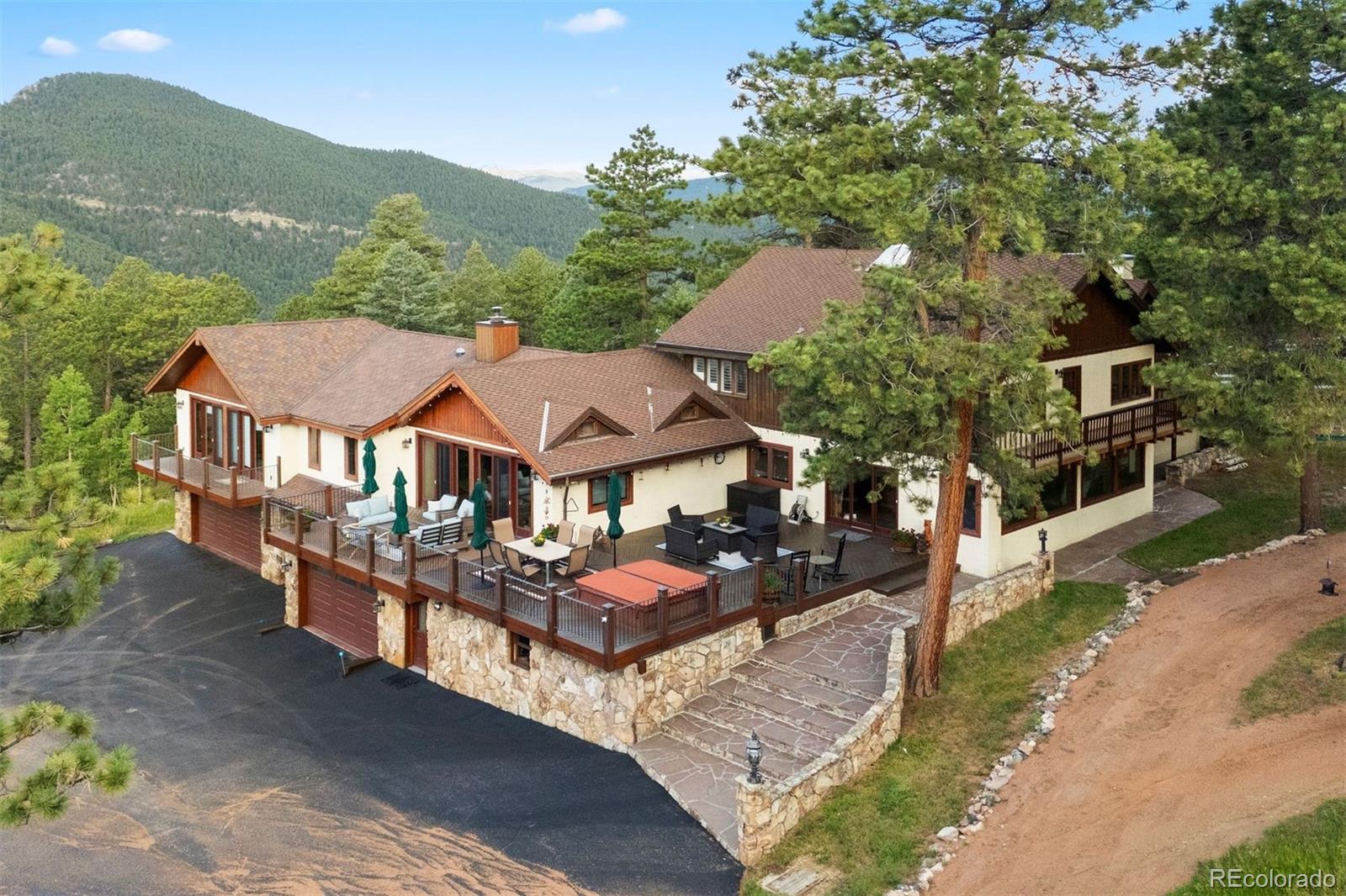 12351 South Ridge Road Conifer, CO 80433 - Photo 5 of 50 an aerial view of a house