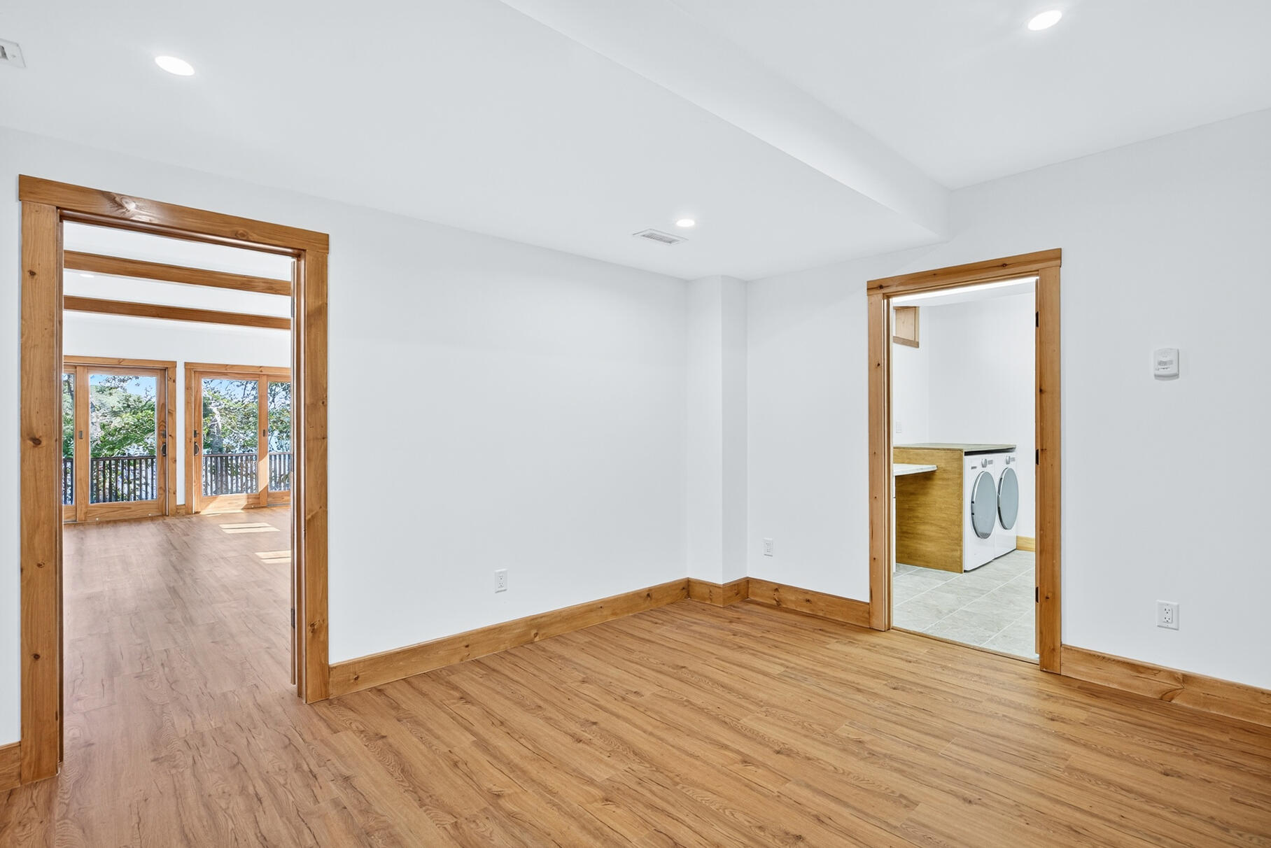 131 Timberlane Drive Mashpee, MA 02649 - Photo 50 of 57 a view of empty room with wooden floor and fan