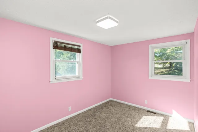 a view of empty room with window