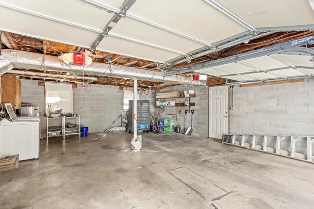 a view of a room with wooden walls