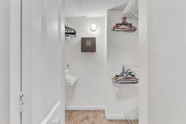 a bathroom with a shower and a sink