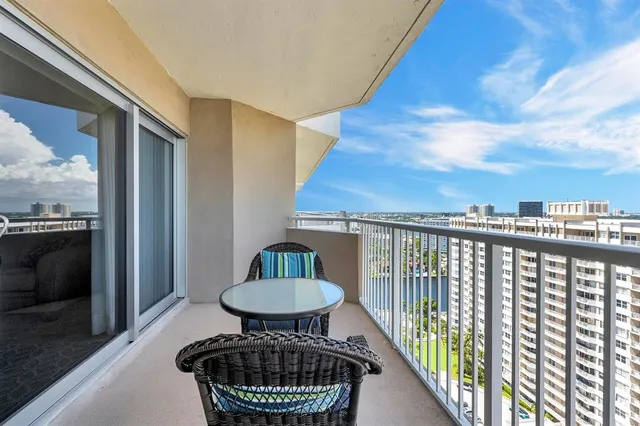 a view of balcony with a potted plant