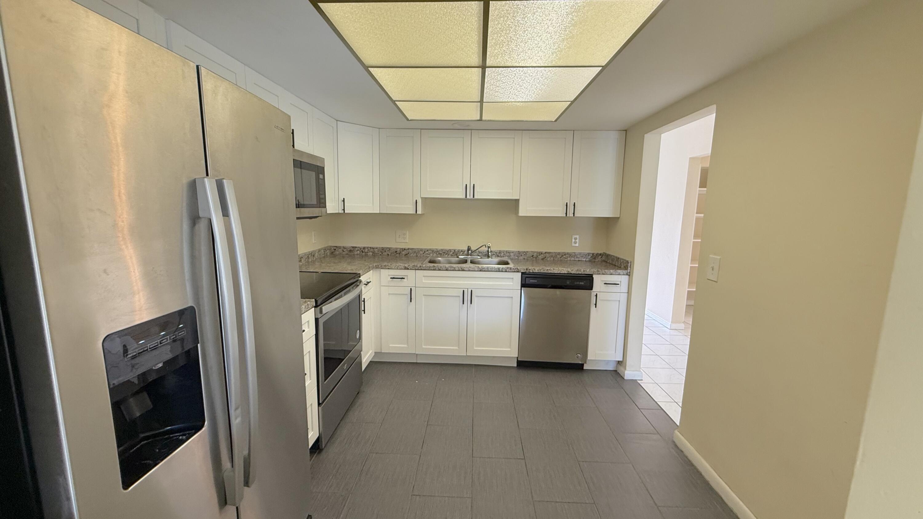 103 Laredo Lane Boca Raton, FL 33487 - Photo 8 of 25 Kitchen 2