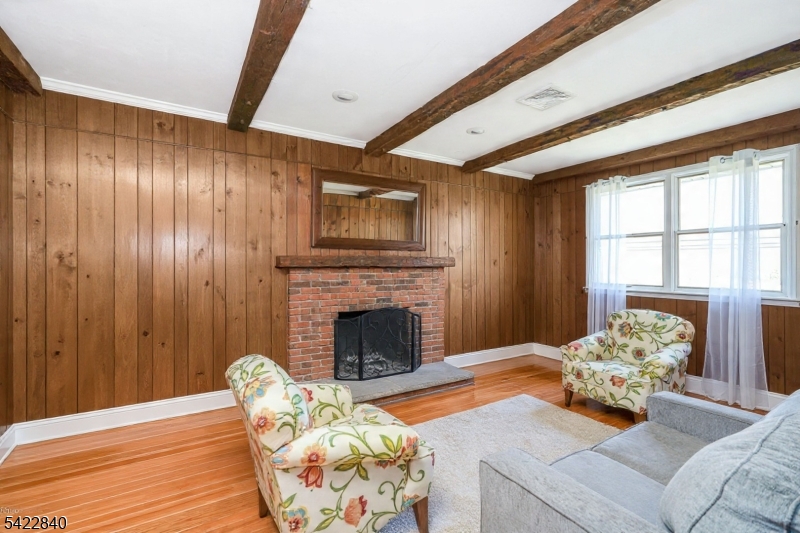 2142 South Branch Road Neshanic Station, NJ 08853 - Photo 12 of 48 a living room with furniture and a fireplace