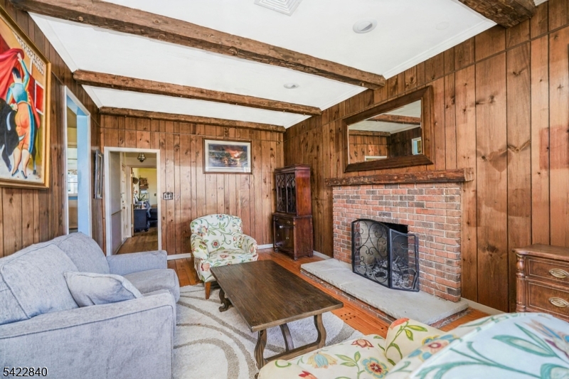2142 South Branch Road Neshanic Station, NJ 08853 - Photo 13 of 48 a living room with furniture and a fireplace