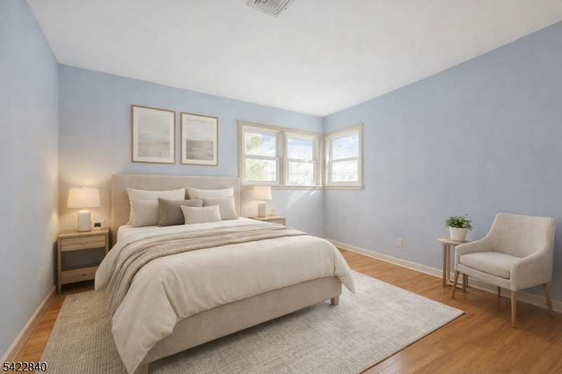2142 South Branch Road Neshanic Station, NJ 08853 - Photo 15 of 48 a bedroom with a bed and chair