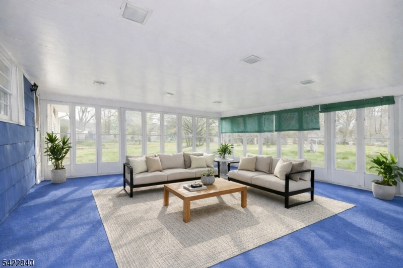 2142 South Branch Road Neshanic Station, NJ 08853 - Photo 24 of 48 a living room with furniture and a large window