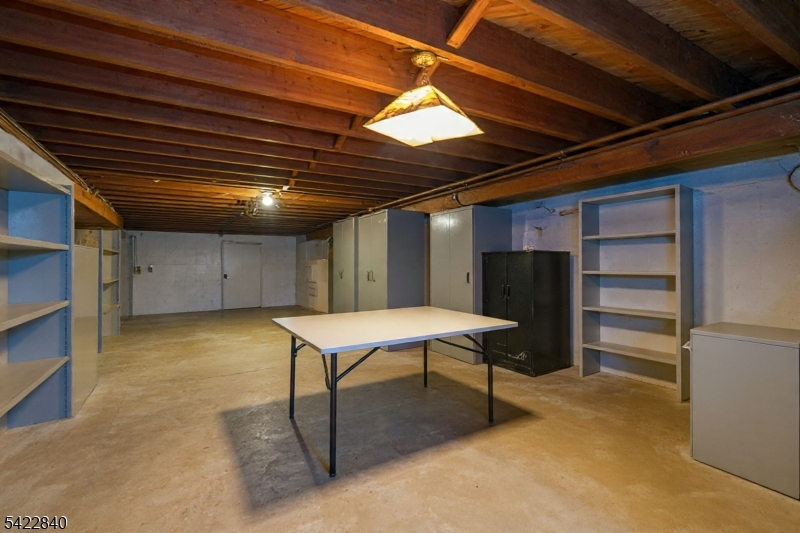 2142 South Branch Road Neshanic Station, NJ 08853 - Photo 27 of 48 a room with a table and chairs