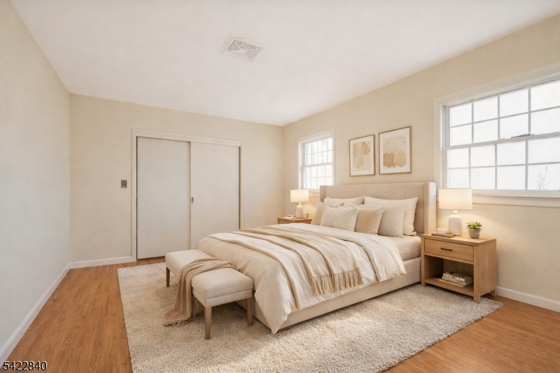 2142 South Branch Road Neshanic Station, NJ 08853 - Photo 30 of 48 a bedroom with a bed and a couch