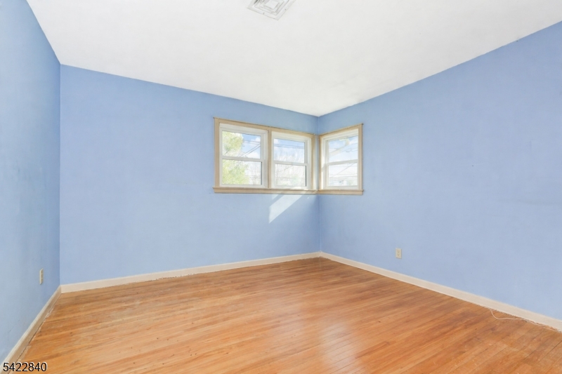 2142 South Branch Road Neshanic Station, NJ 08853 - Photo 37 of 48 a view of a room with wooden floor and windows