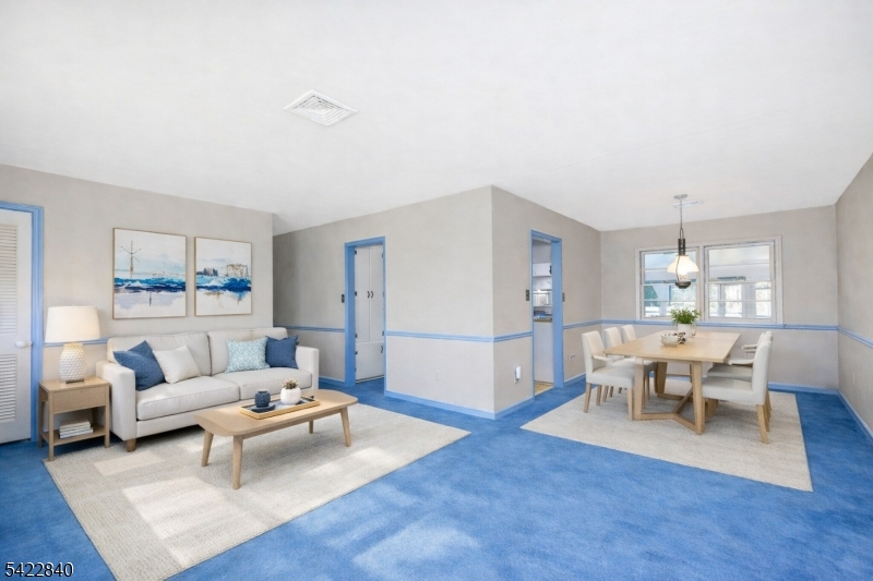 2142 South Branch Road Neshanic Station, NJ 08853 - Photo 4 of 48 a living room with furniture wooden floor and a table