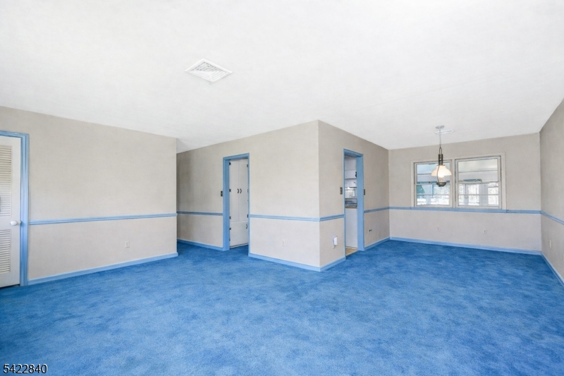 2142 South Branch Road Neshanic Station, NJ 08853 - Photo 45 of 48 an empty room with windows