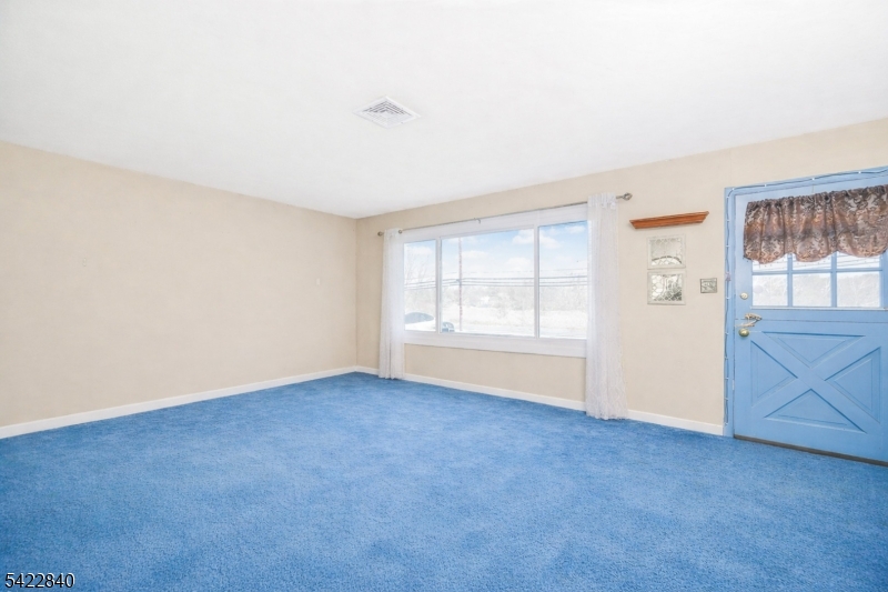 2142 South Branch Road Neshanic Station, NJ 08853 - Photo 46 of 48 an empty room with windows