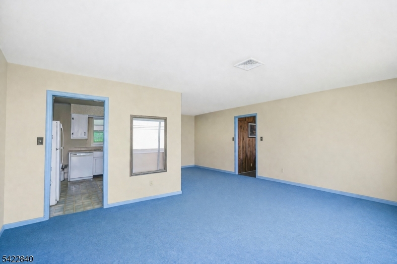2142 South Branch Road Neshanic Station, NJ 08853 - Photo 47 of 48 an empty room with a bathroom and a window