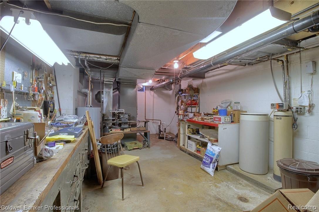1381 North Livernois Road Rochester, MI 48306 - Photo 24 of 34 24-Finished Lower Level Workroom.jpg