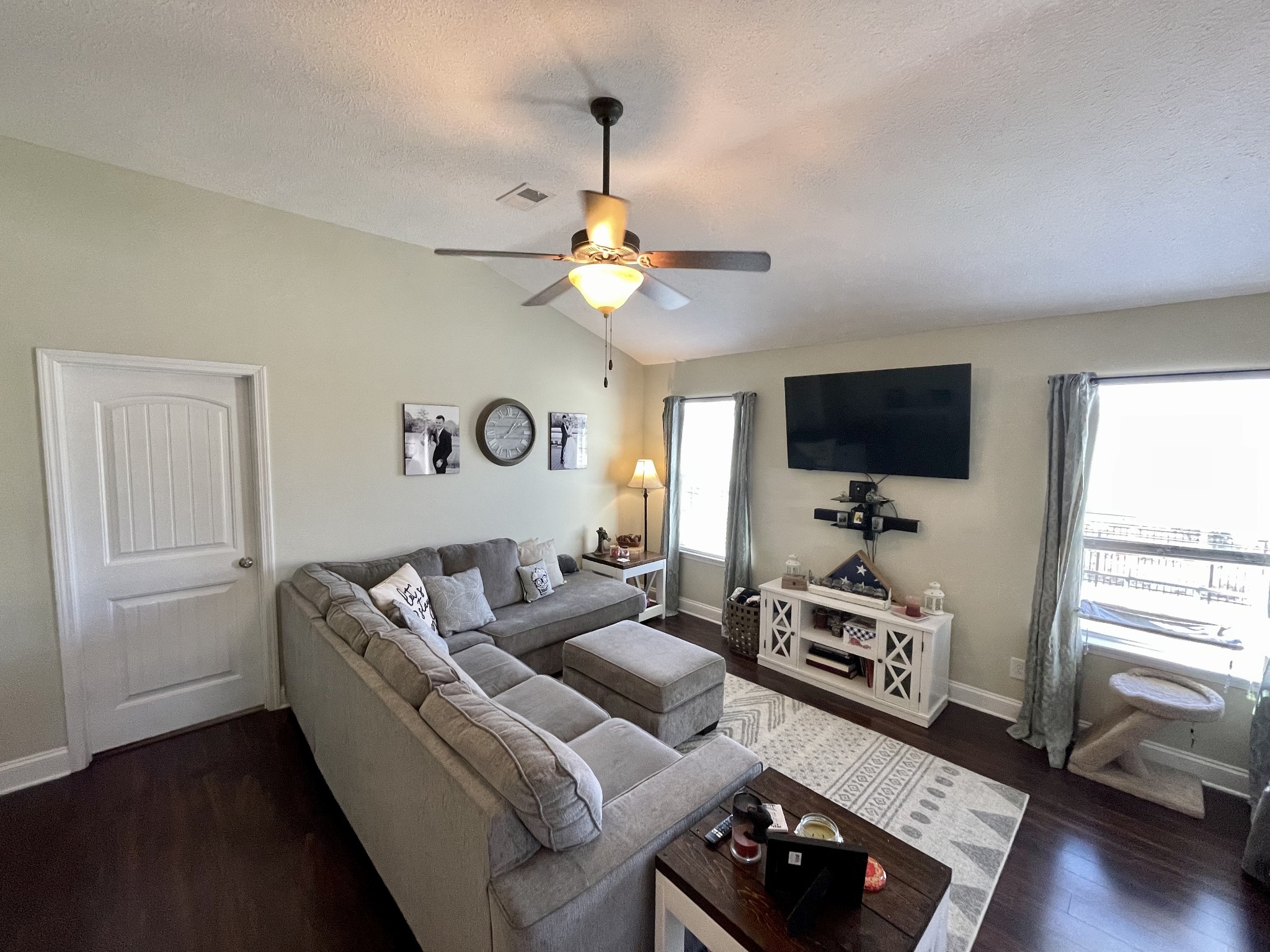 339 Golfview Lane Springfield, TN 37172 - Photo 13 of 34 a living room with furniture a flat screen tv and a window