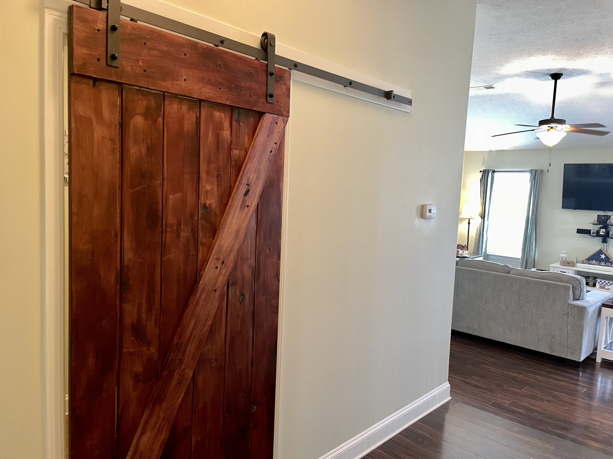 339 Golfview Lane Springfield, TN 37172 - Photo 18 of 34 a view of a utility room with closet and wooden floor