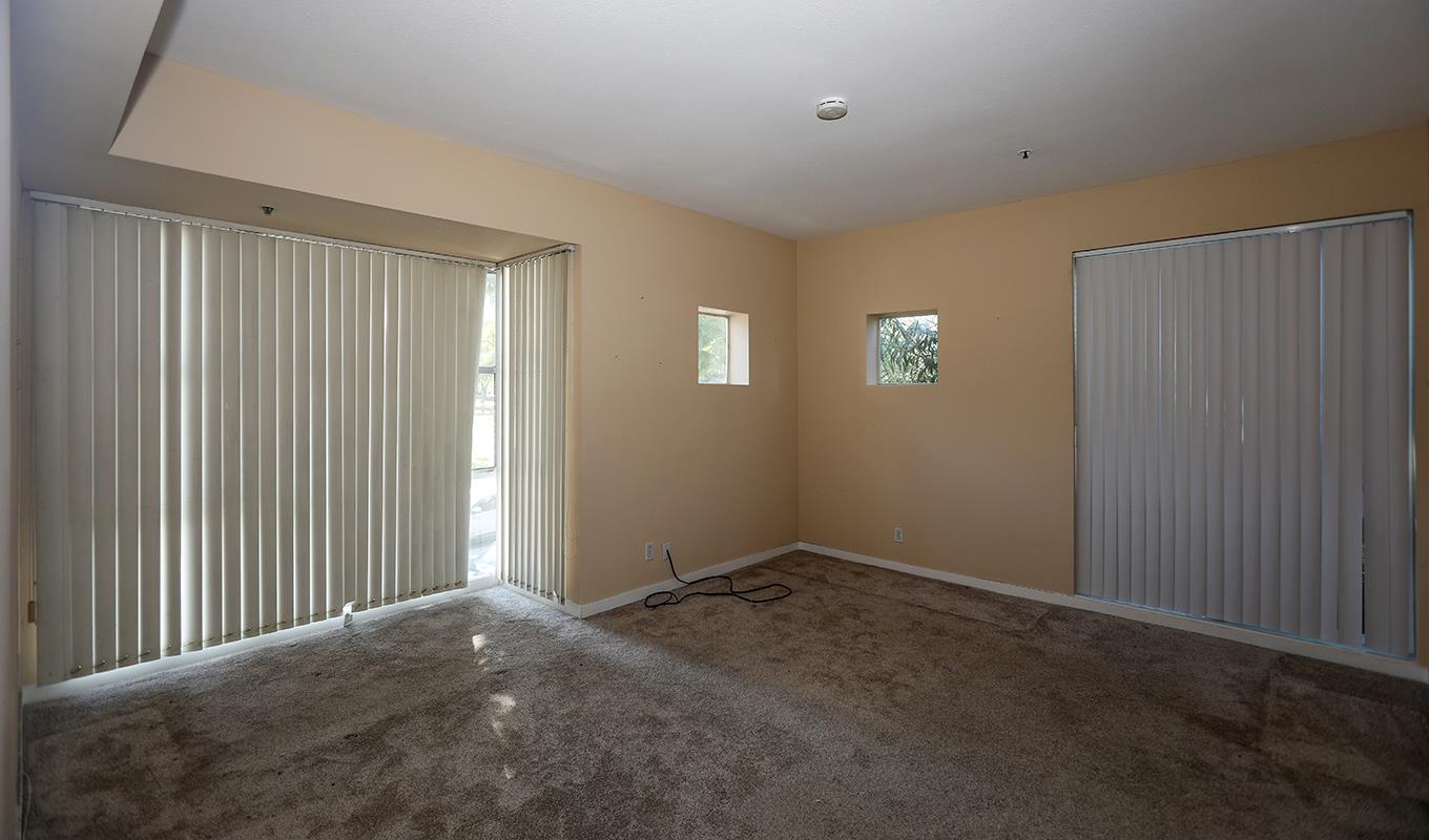 97 East St James Street, Unit 21 San Jose, CA 95112 - Photo 18 of 22 a view of an empty room with closet area
