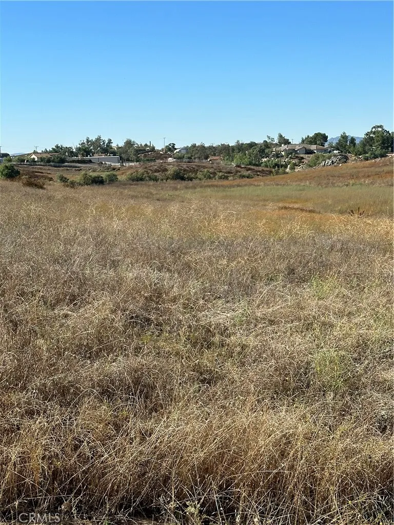 48 Mazoe Winchester, CA 92596 - Photo 7 of 13 a view of a lake with houses in the back