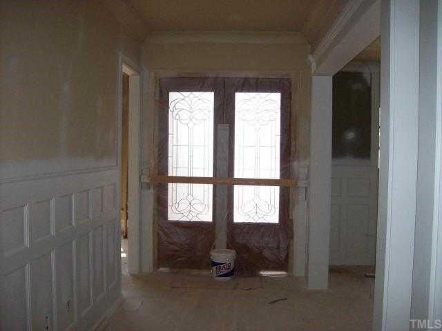 5312 Landguard Drive, Unit 12 Raleigh, NC 27613 - Photo 4 of 10 Popular trim molding throughout the house; egg shell painted trim; wood floors downstairs except the master bedroom, bath and laundry