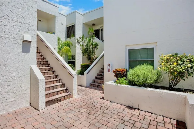 a view of a house with stairs
