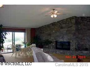 117 Jones Road Leicester, NC 28748 - Photo 6 of 9 a view of livingroom with furniture window and wooden floor