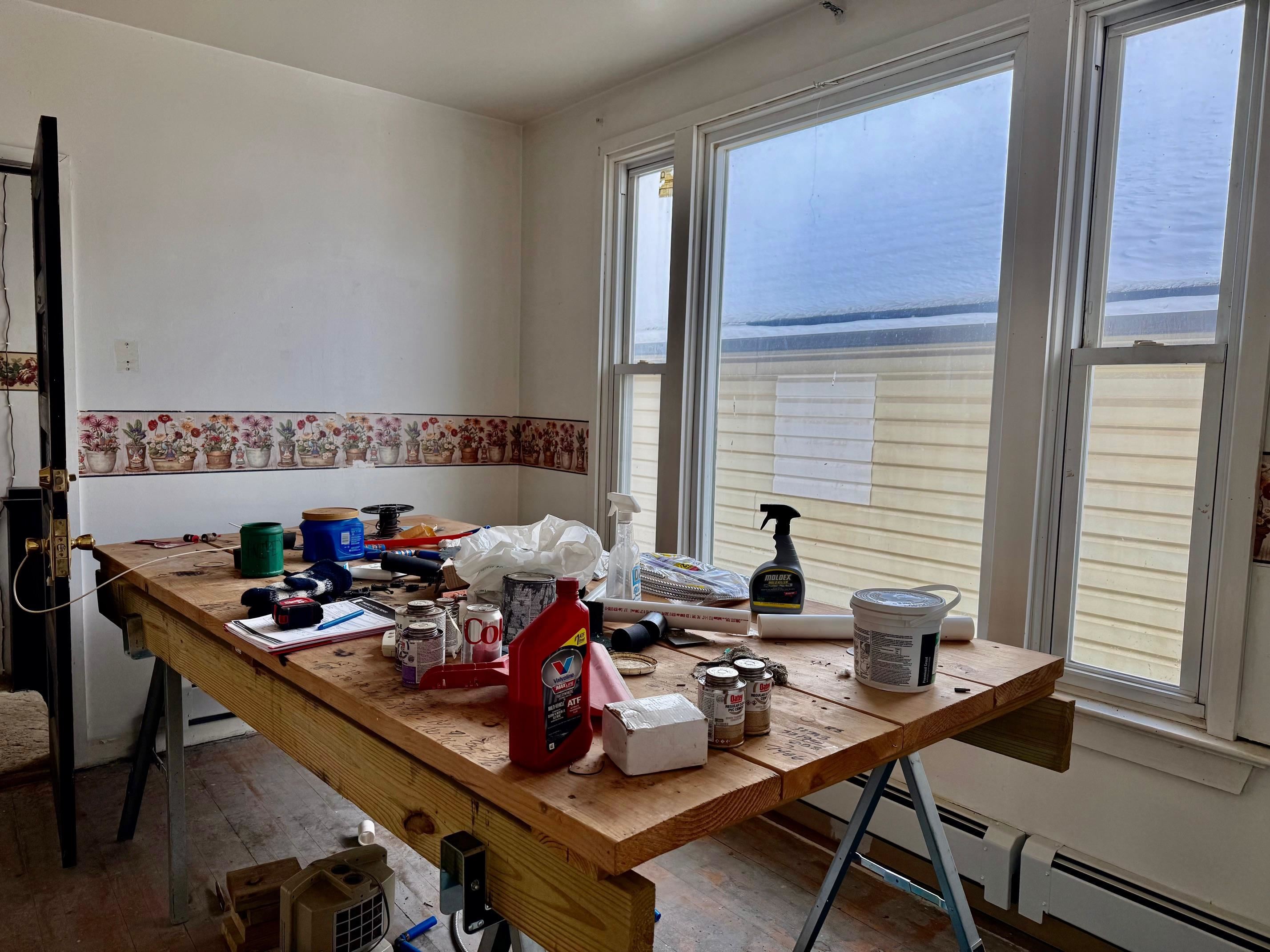 208 5th Street South Virginia, MN 55792 - Photo 2 of 9 Dining space featuring hardwood / wood-style flooring and a baseboard heating unit