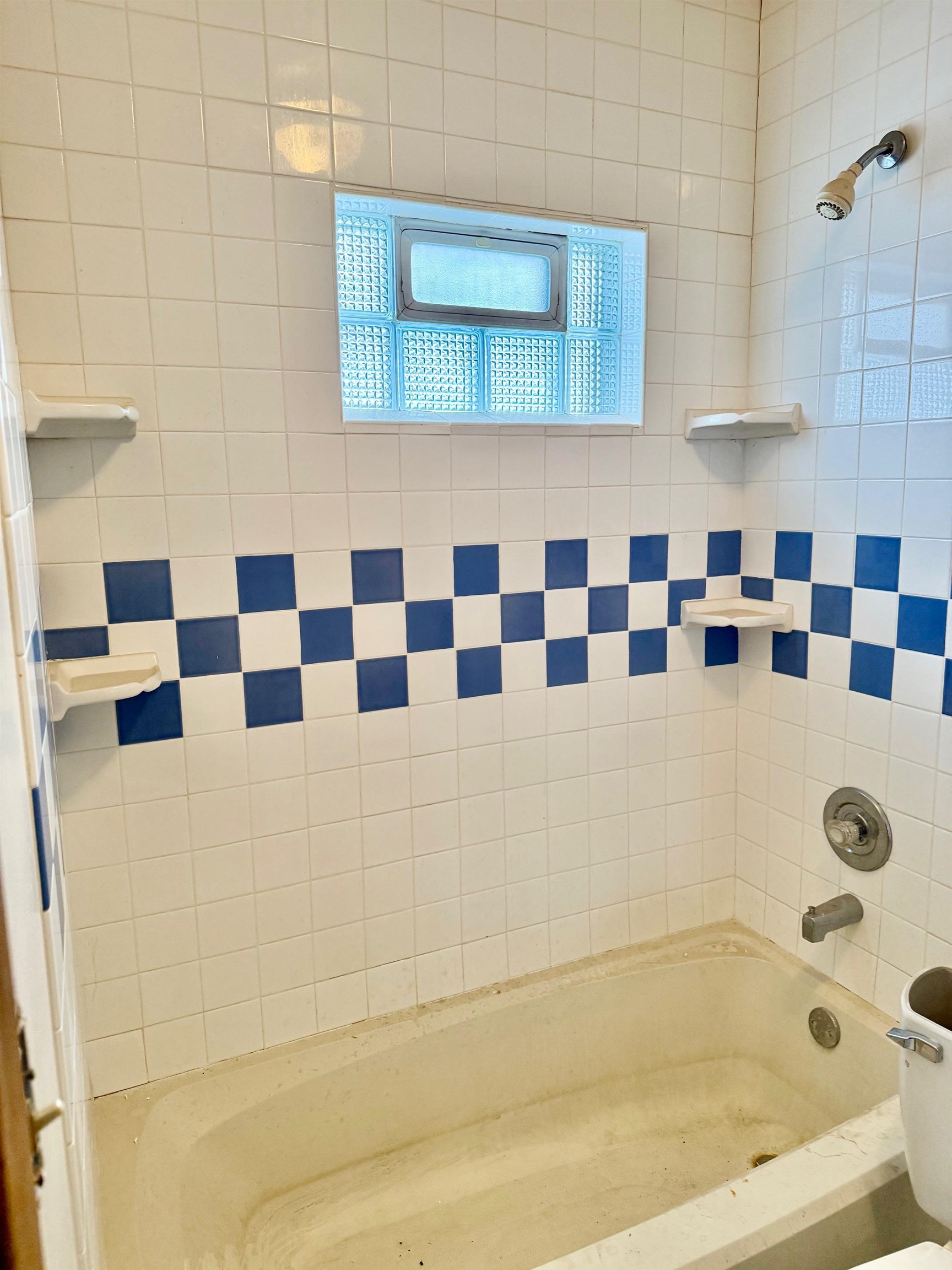 208 5th Street South Virginia, MN 55792 - Photo 7 of 9 Full bathroom featuring shower / bath combination and toilet