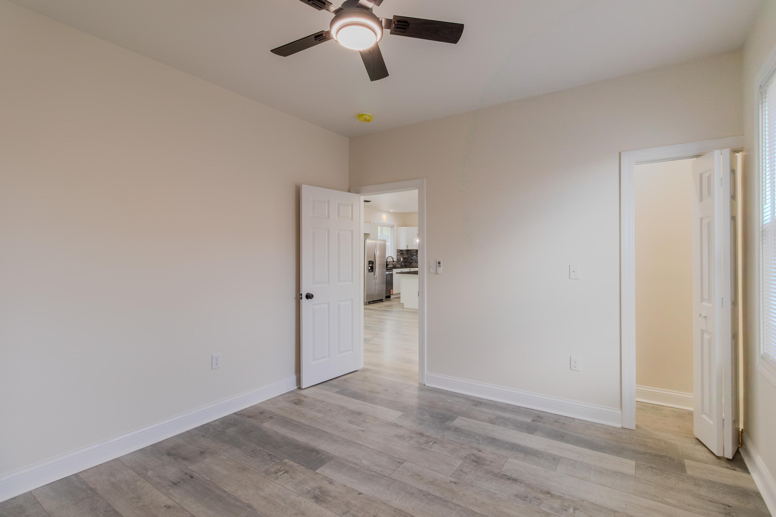 3678 Jackson Street Gary, IN 46408 - Photo 11 of 27 wooden floor in an empty room