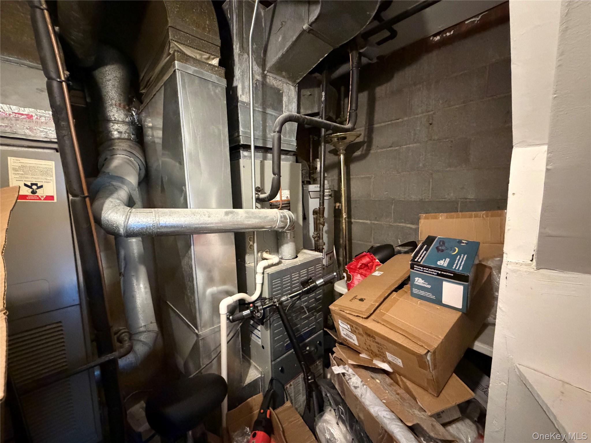 224-01 59th Avenue Queens, NY 11364 - Photo 12 of 13 a view of walk in closet with clothes and shoes