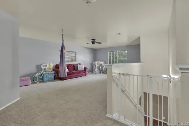 a bed room with furniture and a window