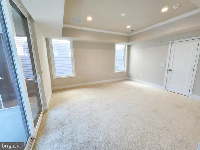 a view of empty room with front door